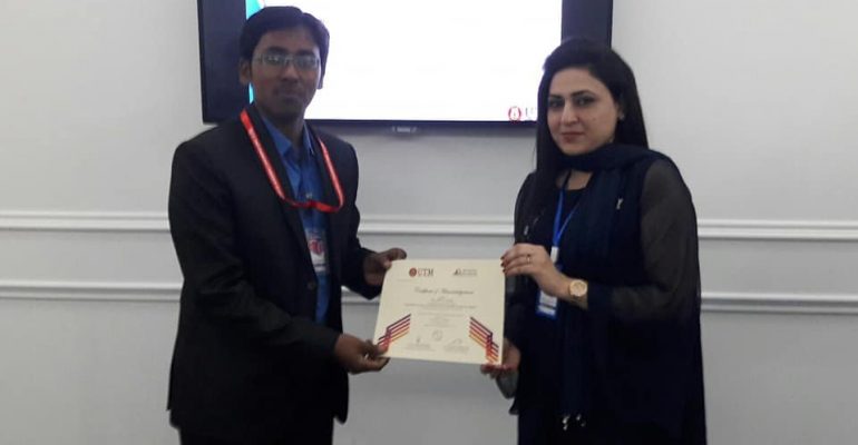 Receiving certificate for excellent presentation on the session